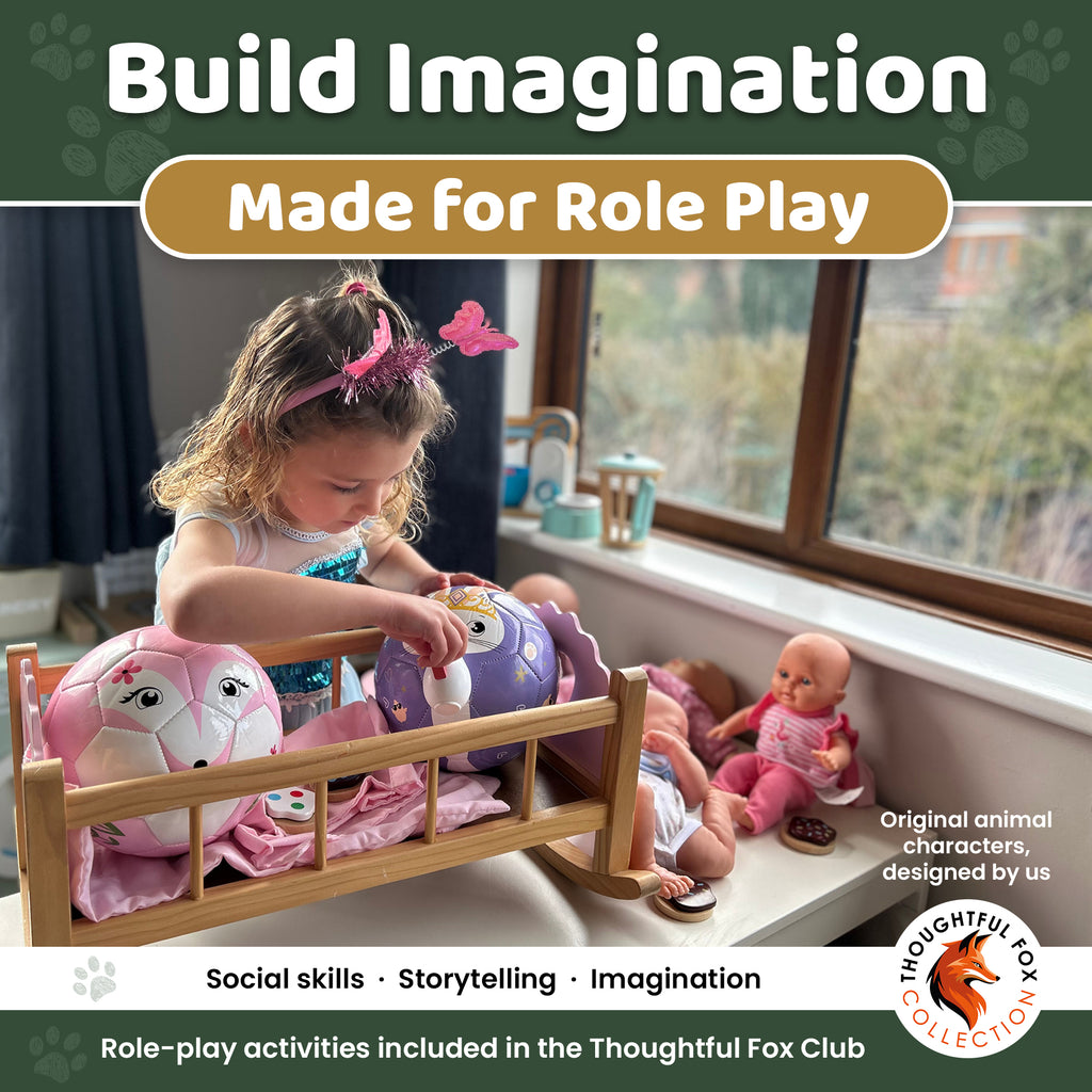 Girl using Thoughtful Fox footballs in role play with dolls, building imagination